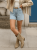 spodenki-jeansowe-msara-g6281-5-z-paskiem-smietankowym-postrzepione-nogawki-jasny-denim-lato-2025-butik-szykownia-1