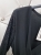 sukienka-koktajlowa-czarna-wloska-zakladkowy-dekolt-v-cekinowe-rekawy-asymetryczna-zakladka-elastyczna-pasek-w-pasie-elegancka-wieczorowa-imprezowa-butik-szykownia-10