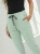 spodnie-kayax-maselko-cygaretki-pistacja-mieta-pastelowe-elastyczne-spodnie-damskie-cygaretki-dresowe-eleganckie-spodnie-na-gumie-spodnie-z-troczkiem-spodnie-casual-wygodne-spodnie-damskie-bawelna-elastan-butik-szykownia-7