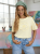 bluzka-kwiat-3d-latynka-pastelowy-zolty-tshirt-damski-bawelna-elastan-aplikacja-kwiat-3d-krotki-rekaw-polska-produkcja-rozmiary-standardowe-i-nadwymiary-modna-bluzka-damska-wiosna-butik-szykownia-7