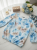 bluzka-kwiatowy-print-madex-pastelowy-blekit-niebieski-bez-pudrowy-roz-kremowy-bluzka-damska-w-kwiaty-gumka-na-dole-gumka-w-rekawach-rekaw-7-8-polska-produkcja-elegancka-bluzka-butik-szykownia-4