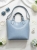 ines-delaure-168168-torebka-damska-baby-blue-duza-a4-z-kosmetyczka-eko-skora-stalowe-okucia-pasek-krotki-dlugi-elegancka-torebka-damska-na-co-dzien-do-pracy-modna-torba-butik-szykownia-3