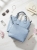 ines-delaure-168168-torebka-damska-baby-blue-duza-a4-z-kosmetyczka-eko-skora-stalowe-okucia-pasek-krotki-dlugi-elegancka-torebka-damska-na-co-dzien-do-pracy-modna-torba-butik-szykownia-5