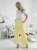 spodnie-limonella-cytrynowe-wide-leg-maselko-elastyczne-guma-w-pasie-pasek-parciany-damskie-wiosenne-wygodne-modne-butik-szykownia-2