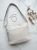 torebka-fashion-bags-l0103-2-jasny-bez-wpadajacy-w-ecru-listonoszka-damska-eko-skora-lekka-regulowany-pasek-zlote-okucia-kieszonka-na-zamek-elegancka-butik-szykownia-1
