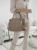 torebka-zamszowa-floraco-f7512-taupe-bezowa-elegancka-torebka-damska-na-ramie-do-reki-z-paskiem-regulowanym-zamek-kieszonki-breloczek-butik-szykownia-3