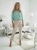 sweter-katrin-stayhere-mietowy-sweter-damski-nietoperz-dekolt-lodka-rekaw-do-lokcia-miekki-delikatny-dzianinowy-wysoka-jakosc-polska-produkcja-wiosenny-elegancki-codzienny-uniwersalny-rozmiar-butik-szykownia-5