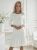 sukienka-blanca-biala-elegancka-sukienka-z-kwiatem-falbana-wloska-sukienka-oversize-lekka-letnia-sukienka-na-komunie-przyjecia-butik-szykownia-2