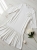 sukienka-blanca-biala-elegancka-sukienka-z-kwiatem-falbana-wloska-sukienka-oversize-lekka-letnia-sukienka-na-komunie-przyjecia-butik-szykownia-3