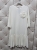sukienka-blanca-biala-elegancka-sukienka-z-kwiatem-falbana-wloska-sukienka-oversize-lekka-letnia-sukienka-na-komunie-przyjecia-butik-szykownia-10