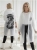 bialy-transparenty-plaszcz-przeciwdeszczowy-bruno-rossi-d19-limitowana-edycja-raincoat-damski-wodoodporny-z-kapturem-oversize-lekki-na-deszcz-podrozny-modny-butik-szykownia-1