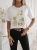 bluzka-tshirt-agape-biala-oversize-aplikacja-3d-rower-zolty-krotki-rekaw-bawelna-elastan-wloska-produkcja-modna-casual-wiosna-lato-butik-szykownia-1