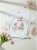 bluzka-tshirt-agape-biala-oversize-aplikacja-3d-rower-rozowy-krotki-rekaw-bawelna-elastan-wloska-produkcja-modna-casual-wiosna-lato-butik-szykownia-4