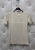 bluzka-tshirt-simple-latynka-bezowa-napis-bialy-small-size-bawelna-elastan-minimalistyczny-basic-krotki-rekaw-okragly-dekolt-polska-produkcja-kolekcja-wiosna-2026-butik-szykownia-7