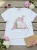 bluzka-tshirt-agape-biala-oversize-aplikacja-3d-torebka-pudrowy-roz-krotki-rekaw-bawelna-elastan-wloska-produkcja-modna-casual-wiosna-lato-butik-szykownia-3