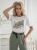 bluzka-tshirt-agape-biala-oversize-aplikacja-3d-trampek-zielony-krotki-rekaw-bawelna-elastan-wloska-produkcja-modna-casual-wiosna-lato-butik-szykownia-5