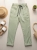 spodnie-kayax-cygaretki-mom-fit-pistacjowe-zielone-pastelowe-elastyczne-damskie-dresowe-eleganckie-z-troczkiem-casual-wygodne-butik-szykownia-3