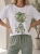 bluzka-tshirt-agape-biala-oversize-aplikacja-3d-balony-zielone-krotki-rekaw-bawelna-elastan-wloska-produkcja-modna-casual-wiosna-lato-butik-szykownia-1