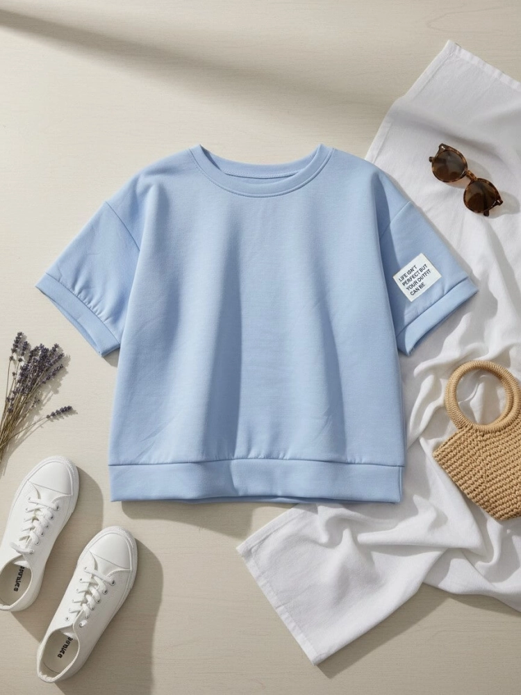 komplet-dresowy-niebieski-baby-blue-oversize-krotki-rekaw-spodnie-7-8-wiskoza-elastyczny-material-maselko-kieszenie-guma-w-pasie-casual-wygodny-zestaw-damski-modny-komplet-na-co-dzien-butik-szykownia-4