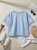 komplet-dresowy-niebieski-baby-blue-oversize-krotki-rekaw-spodnie-7-8-wiskoza-elastyczny-material-maselko-kieszenie-guma-w-pasie-casual-wygodny-zestaw-damski-modny-komplet-na-co-dzien-butik-szykownia-4