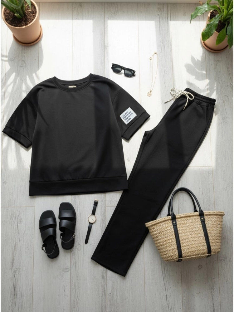 komplet-dresowy-czarny-oversize-krotki-rekaw-spodnie-7-8-wiskoza-elastyczny-material-maselko-kieszenie-guma-w-pasie-casual-wygodny-zestaw-damski-modny-komplet-na-co-dzien-butik-szykownia-10