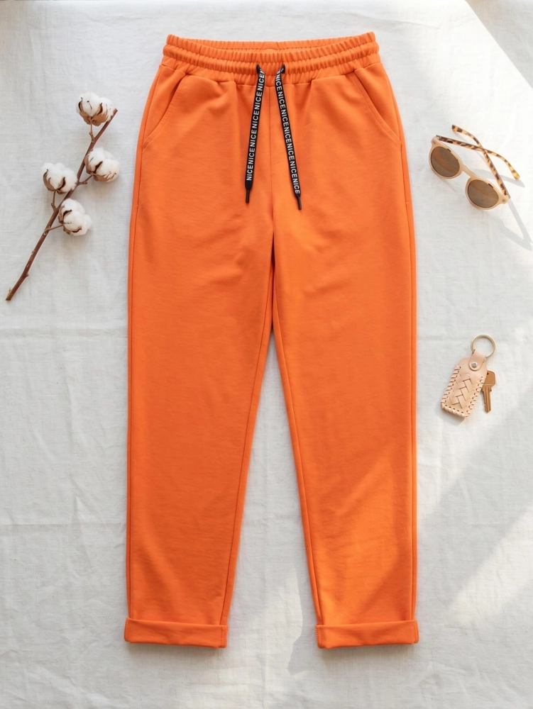 spodnie-kayax-maselko-cygaretki-pomaranczowe-elastyczne-damskie-cygaretki-dresowe-eleganckie-na-gumie-z-troczkiem-casual-wygodne-damskie-bawelna-elastan-butik-szykownia-3