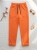 spodnie-kayax-maselko-cygaretki-pomaranczowe-elastyczne-damskie-cygaretki-dresowe-eleganckie-na-gumie-z-troczkiem-casual-wygodne-damskie-bawelna-elastan-butik-szykownia-3