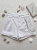 spodenki-moon-girl-kpd002-1-biale-jeansowe-krotkie-odpinany-lancuszek-guma-z-tylu-bawelniane-letnie-spodenki-damskie-butik-szykownia-4