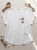 bluzka-nativa-biala-bawelniano-lniana-oversize-duze-ozdobne-guziki-naturalny-material-butik-szykownia-3